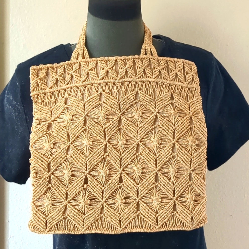 Very intricate bag made of natural fibers.